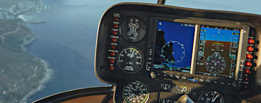 Helicopter cockpit flying over water